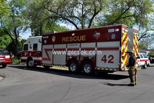 Houston Community Rescue Fire Truck and Firefighters on Emergency Standby