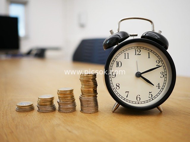 Time and Money: A Financial Planning Scene with Stacked Coins
