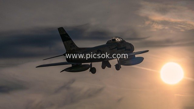 North American F-86 Sabre Model Flying Against Sunset Sky